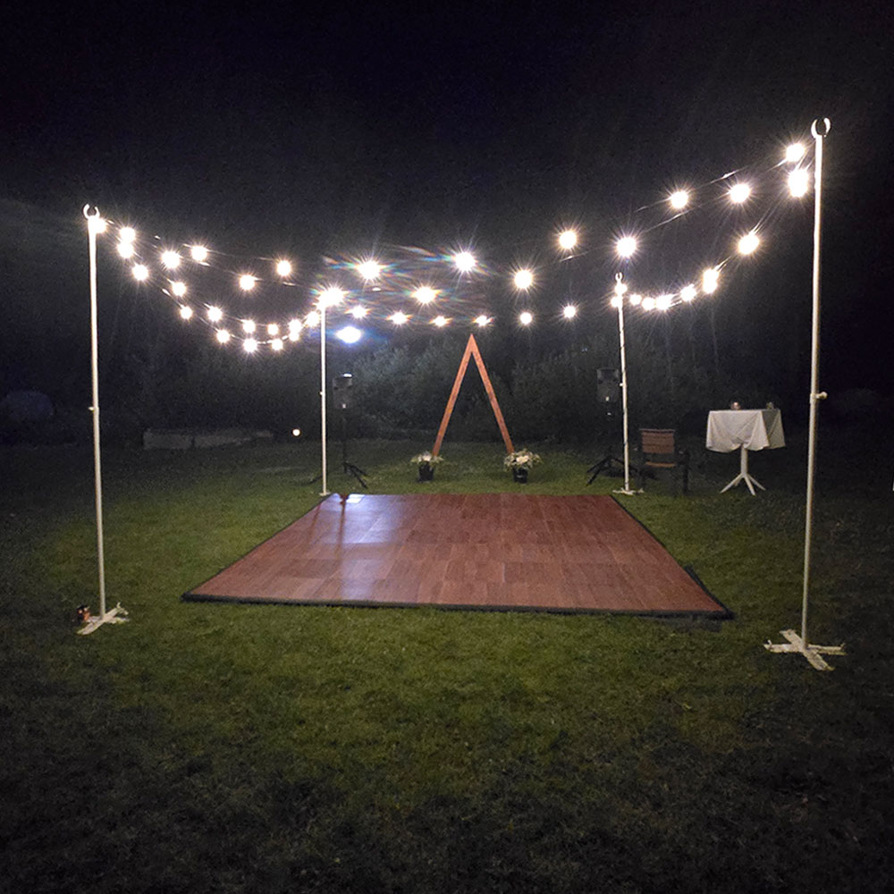 dance floor and light strands and poles