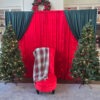 red chair with santa backdrop